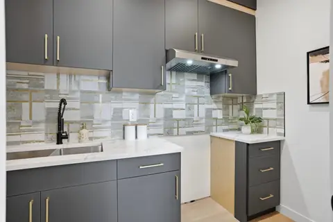 Its spice kitchen. Furniture and décor are staging for the photos.